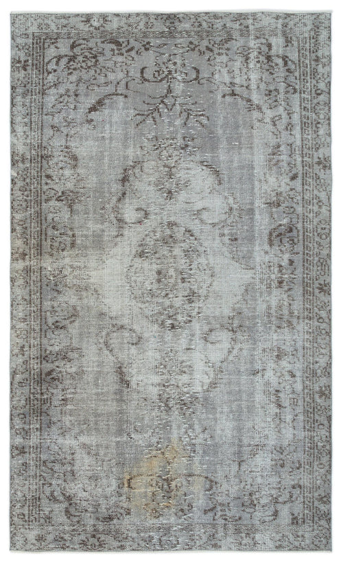 Load image 1 in gallery view. Grey and taupe distressed traditional rug with a central medallion and ornate border pattern.