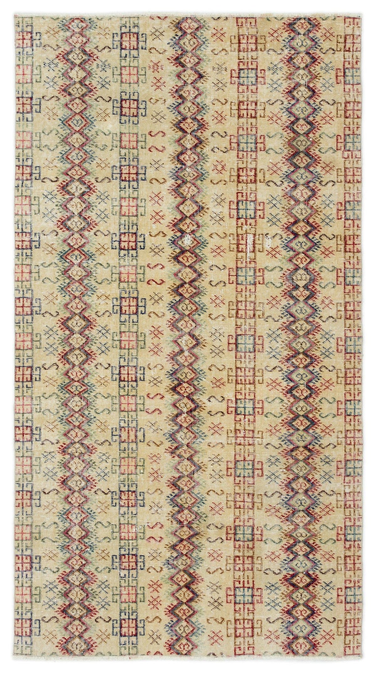 Beige rug with vertical stripes of geometric diamonds and repeating tribal motifs in red, blue, and green.
