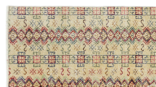 Load image 1 in gallery view. Beige rug with horizontal bands of red and blue geometric grid patterns, diamond motifs, and small tribal symbols.