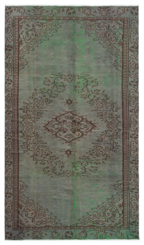 Load image 1 in gallery view. Distressed sage green and brown rug with a traditional central medallion and ornate border pattern.