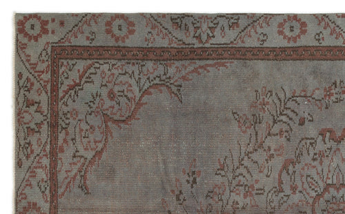 Load image 1 in gallery view. Grey and terracotta traditional rug with a distressed floral border and corner motif on a white background.