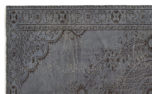 Load image 1 in gallery view. Slate blue and charcoal distressed rug with a traditional floral medallion border and ornate corner motifs.