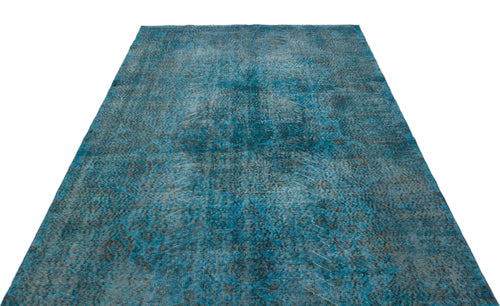 Load image 1 in gallery view. Teal and charcoal distressed rug with a faded traditional medallion pattern on a white background.