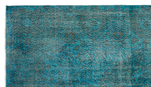 Load image 1 in gallery view. Teal and charcoal distressed rug with a faded traditional medallion pattern.