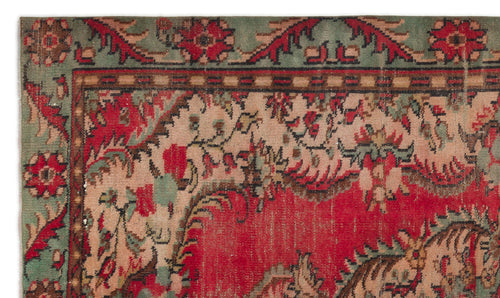 Load image 1 in gallery view. Traditional rug with red, sage green, and beige floral patterns and a decorative border.