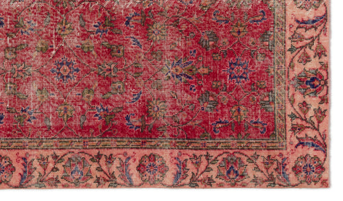 Load image 1 in gallery view. Red and pink traditional rug with a distressed floral medallion pattern and a detailed botanical border.
