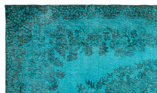 Load image 1 in gallery view. Teal and black distressed rug with a traditional floral medallion pattern and ornate border.