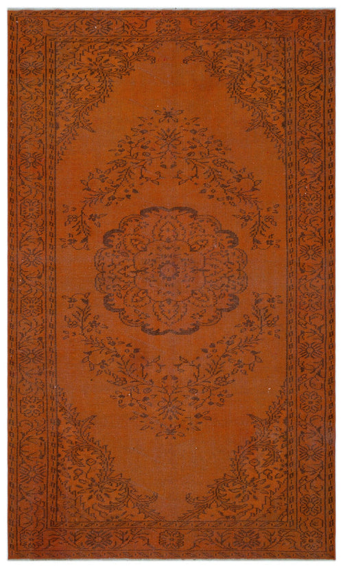 Load image 1 in gallery view. Burnt orange rug with a dark brown central floral medallion and intricate botanical border pattern.