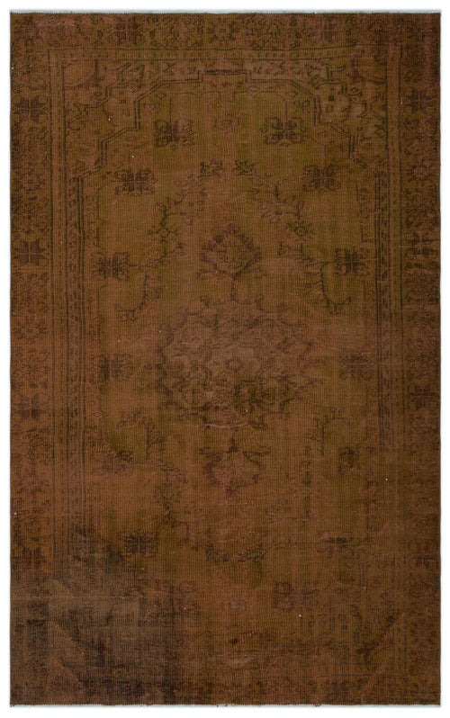 Load image 1 in gallery view. Monochromatic brown vintage-style rug with a faded central floral medallion and ornate border on a white background.