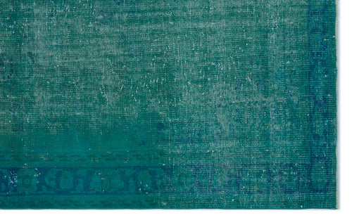 Load image 1 in gallery view. Teal and blue distressed vintage-style rug with a faded, worn texture and a subtle border pattern.