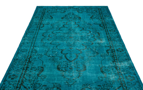 Load image 1 in gallery view. Teal and black distressed area rug with a traditional central medallion pattern on a white background.