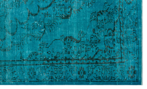 Load image 1 in gallery view. Teal rug with a distressed black traditional floral medallion pattern and a geometric border.