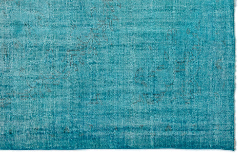 Load image 1 in gallery view. Teal distressed rug with a faded, textured pattern on a white background.