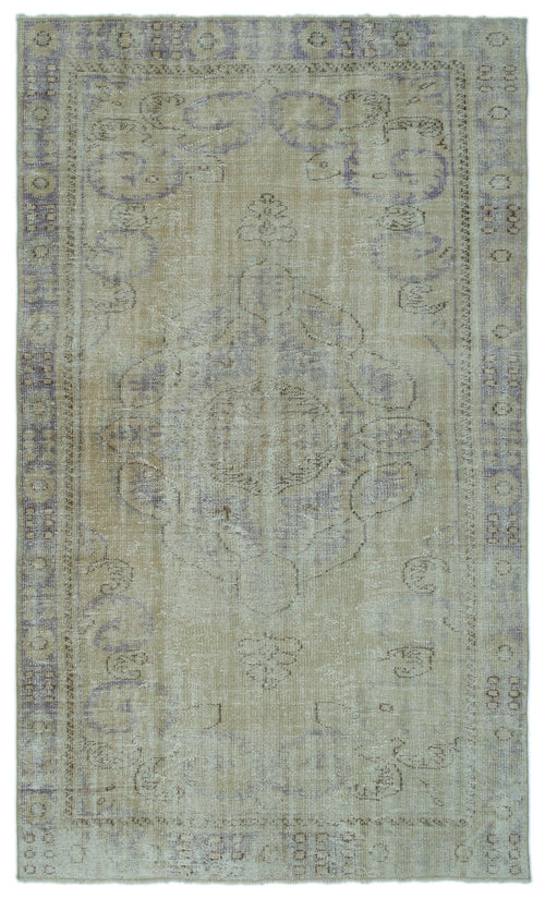 Load image 1 in gallery view. Beige and muted purple vintage-style rug with a central medallion and ornate border on a white background.