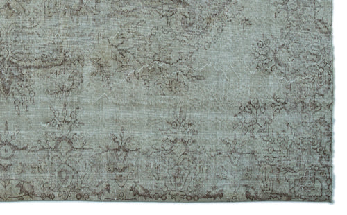 Load image 1 in gallery view. Light gray rug with a faded brown floral medallion pattern and a distressed, vintage-style texture.
