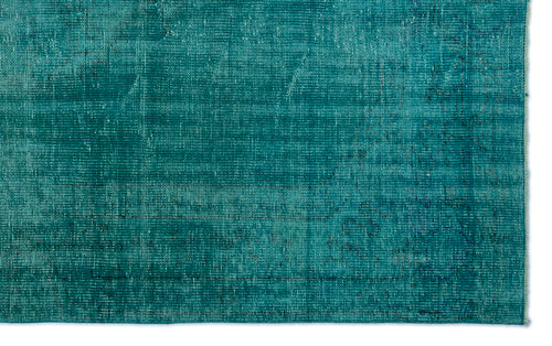 Load image 1 in gallery view. Teal distressed rug with a faint, worn traditional pattern on a white background.