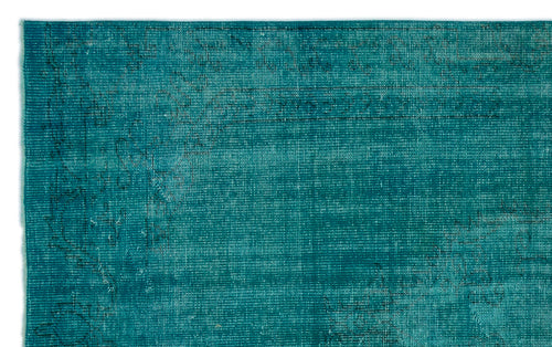 Load image 1 in gallery view. Teal distressed rug with a faded, intricate traditional medallion pattern.
