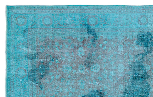 Load image 1 in gallery view. Bright turquoise rug with a distressed, faded traditional medallion pattern in dark grey.