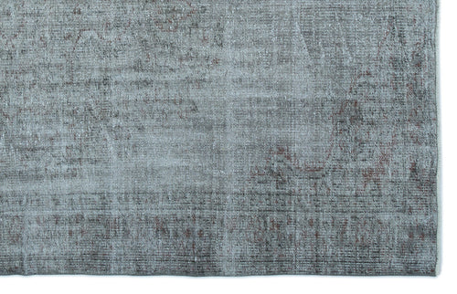 Load image 1 in gallery view. Blue-grey distressed rug with a faded traditional medallion pattern and visible woven texture.
