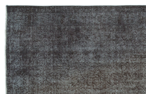 Load image 1 in gallery view. Dark charcoal and black distressed rug with a subtle, fine-lined texture.