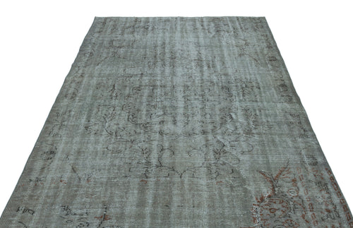 Load image 1 in gallery view. Grey distressed vintage-style rug with a faded central medallion and subtle rust-colored accents on a white background.