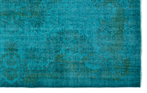 Load image 1 in gallery view. Teal and dark green rug with a distressed, faded traditional floral medallion pattern.