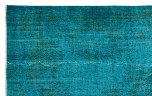 Load image 1 in gallery view. Teal and dark green distressed rug with a faint, overdyed traditional medallion pattern.