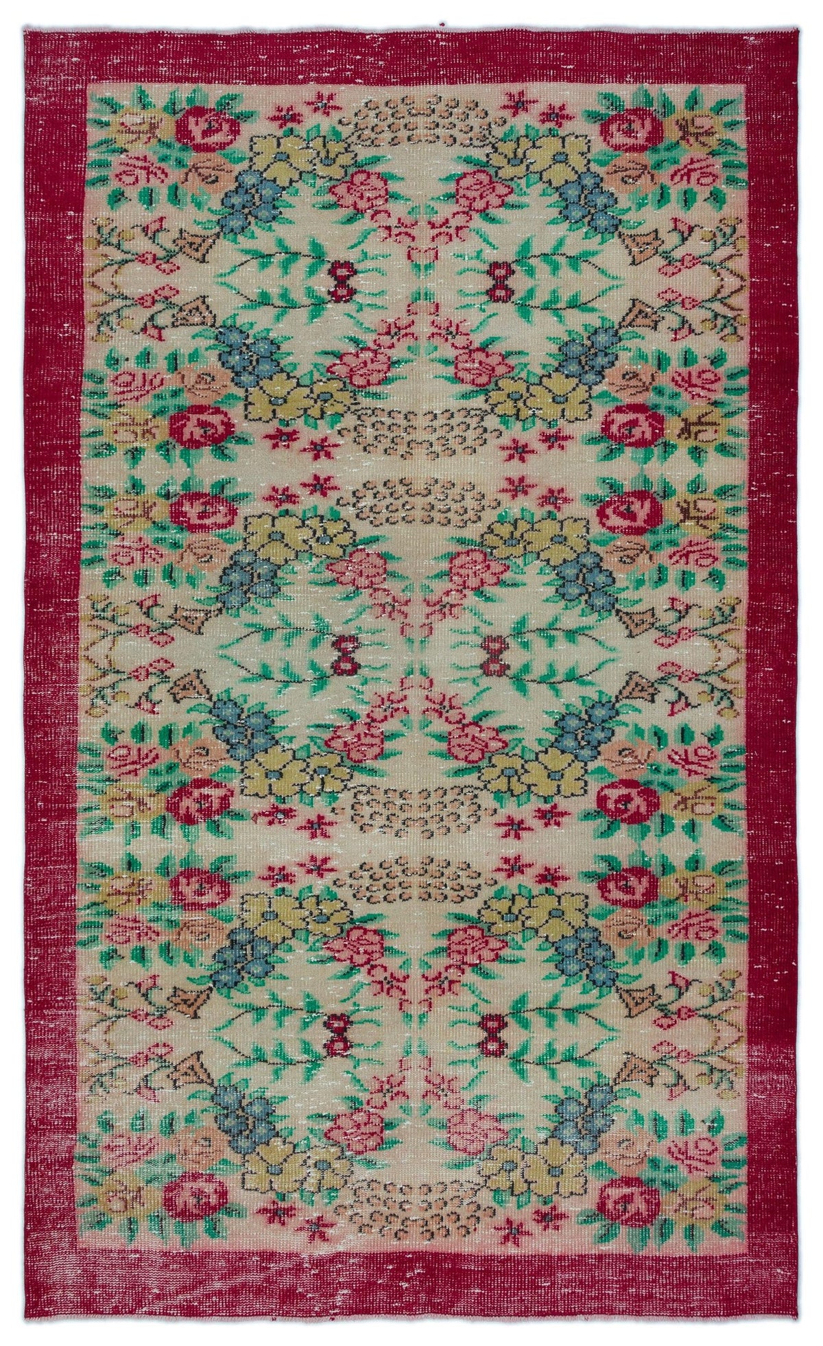 Beige rug with a red border and a repeating floral pattern in pink, yellow, blue, and green.