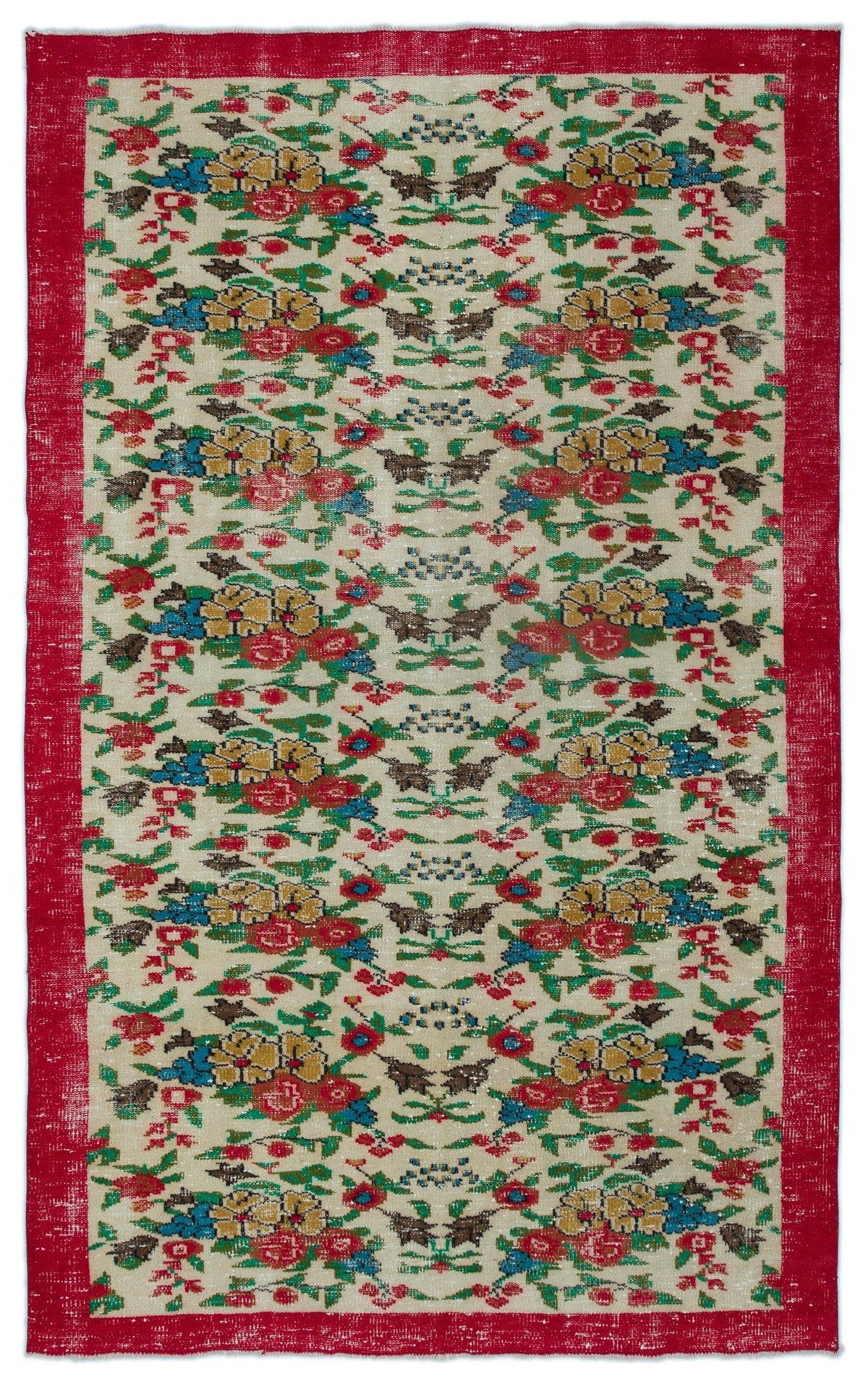 Cream rug with a red border and a repeating floral pattern in red, yellow, blue, and green on a white background.