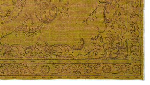Load image 1 in gallery view. Mustard yellow rug with a dark brown distressed floral medallion pattern and a detailed border.