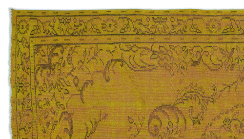 Load image 1 in gallery view. Mustard yellow rug with a dark brown distressed floral border and central vine pattern.