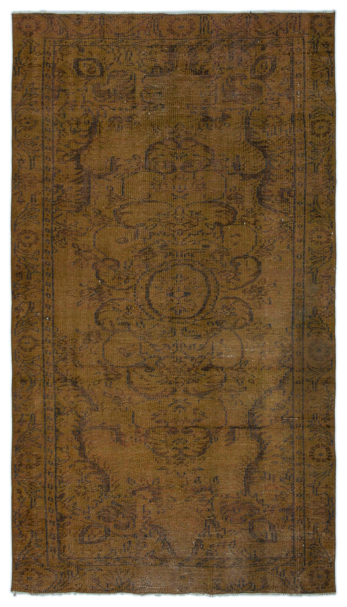 Monochromatic brown vintage-style rug with a faded central medallion and intricate border pattern.