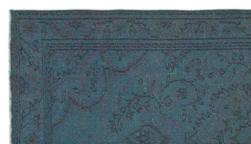 Load image 1 in gallery view. Teal blue rug with a dark, distressed traditional floral medallion pattern and a bordered edge.