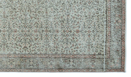 Load image 1 in gallery view. Distressed beige and grey rug with a faded floral trellis pattern and a muted terracotta border.