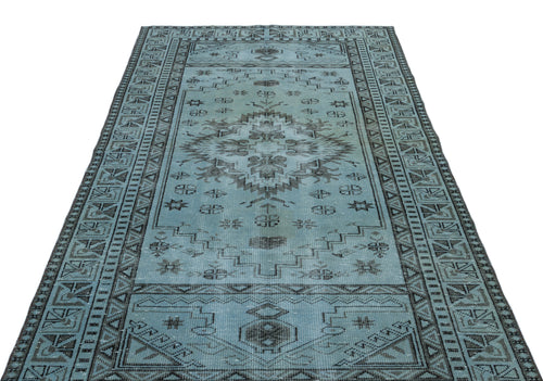 Load image 1 in gallery view. Light blue and charcoal grey traditional rug with a central medallion and geometric border pattern on a white background.