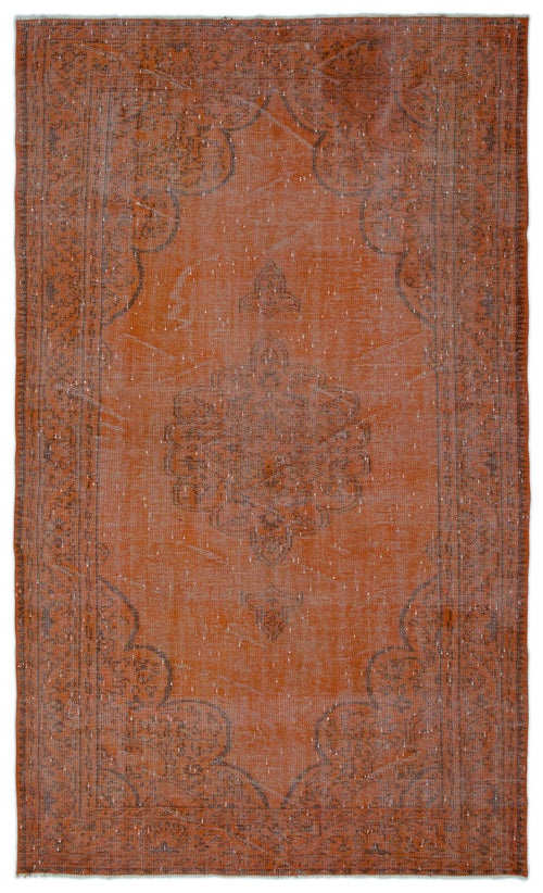 Load image 1 in gallery view. Rust-colored vintage-style rug with a faded charcoal medallion pattern and distressed texture on a white background.