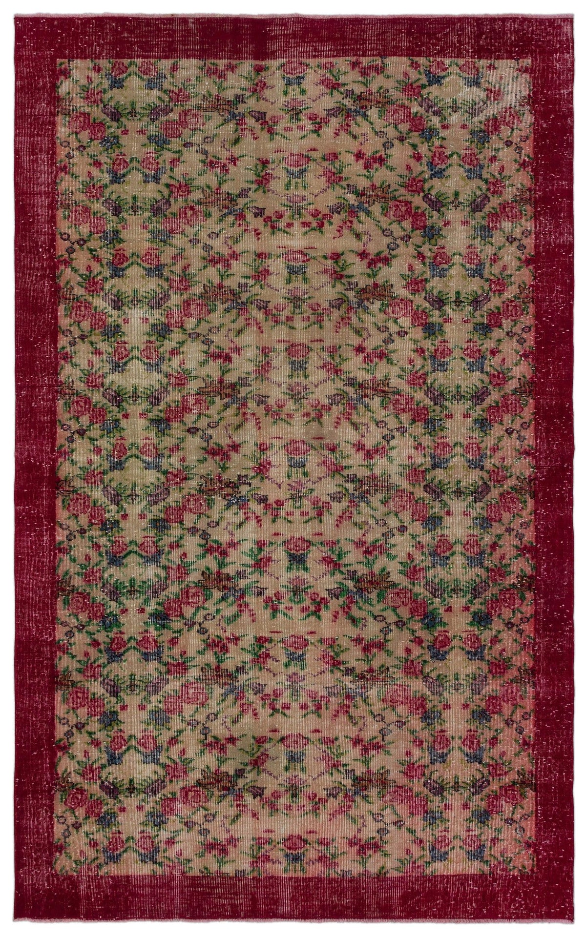 Beige rug with a repeating floral pattern in pink, green, and blue, framed by a wide, distressed deep red border.
