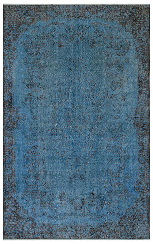 Load image 1 in gallery view. Blue and charcoal distressed traditional rug with a central floral medallion and ornate border.