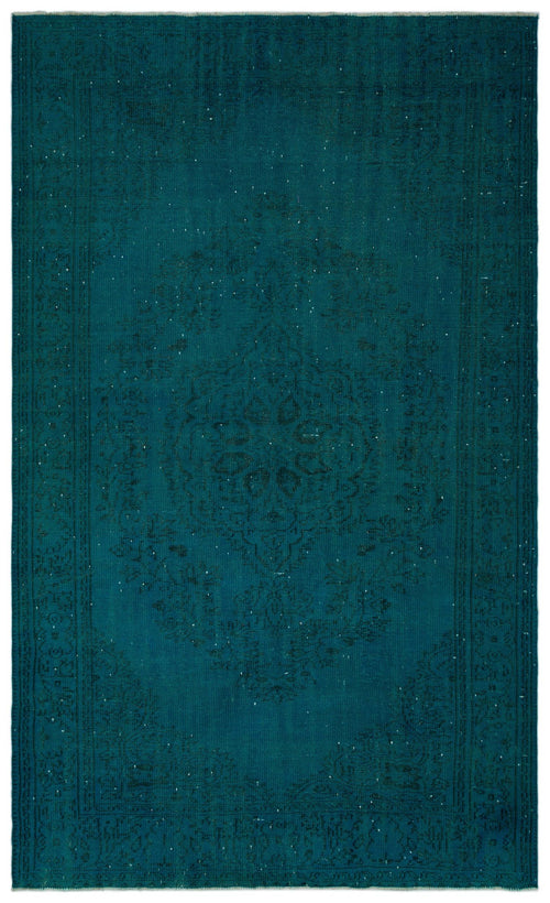 Load image 1 in gallery view. Teal distressed rug with a subtle, dark-toned central medallion and traditional border pattern.