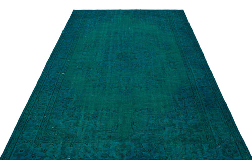 Load image 1 in gallery view. Teal monochromatic rug with a traditional distressed medallion pattern on a white background.