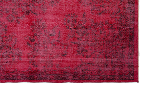 Load image 1 in gallery view. Vibrant red rug with a distressed black floral medallion pattern and a thin border.