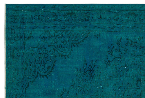 Load image 1 in gallery view. Teal rug with a dark, distressed traditional floral medallion pattern and a bordered edge.