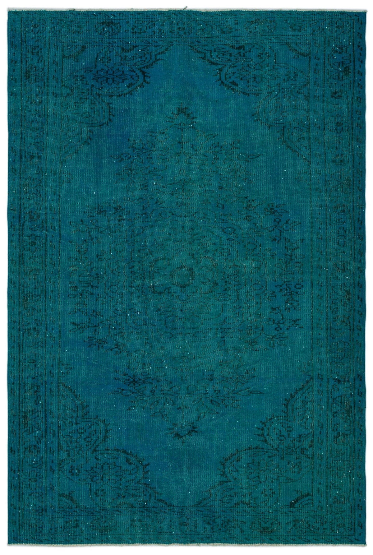 Teal monochromatic rug with a faded, distressed traditional medallion pattern.