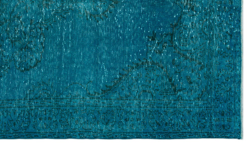Load image 1 in gallery view. Teal distressed rug with a faded traditional medallion pattern and a bordered edge.
