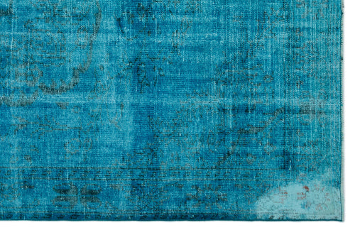 Load image 1 in gallery view. Bright turquoise distressed rug with a faded traditional medallion pattern and dark blue accents.