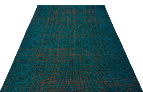 Load image 1 in gallery view. Teal and rust-colored distressed area rug with a faded, intricate traditional pattern on a white background.