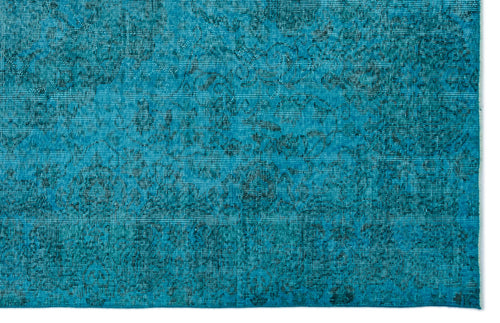 Load image 1 in gallery view. Teal and black distressed rug with a faded traditional floral medallion pattern.