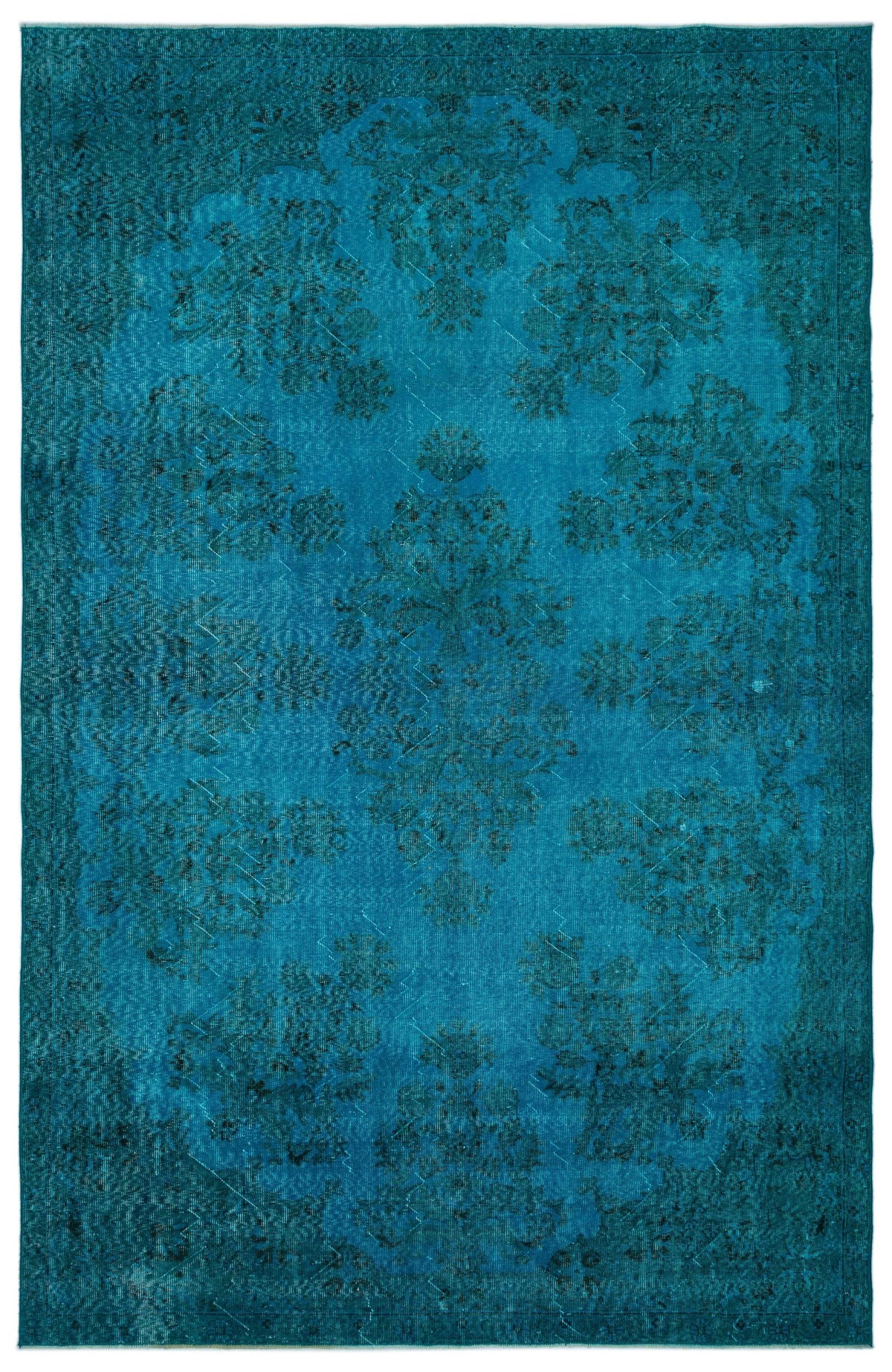 Teal monochromatic rug with a distressed traditional floral medallion pattern on a white background.