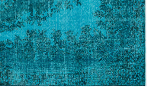 Load image 1 in gallery view. Teal and dark blue distressed rug with a faded traditional floral medallion pattern.