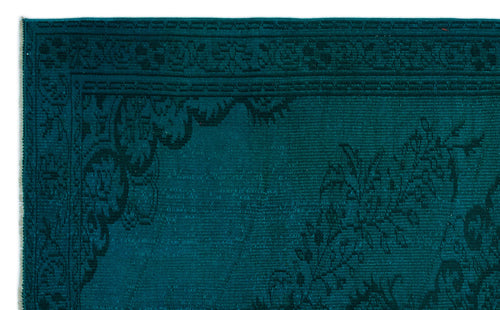 Load image 1 in gallery view. Teal monochromatic rug with a traditional ornate floral border and central medallion pattern.